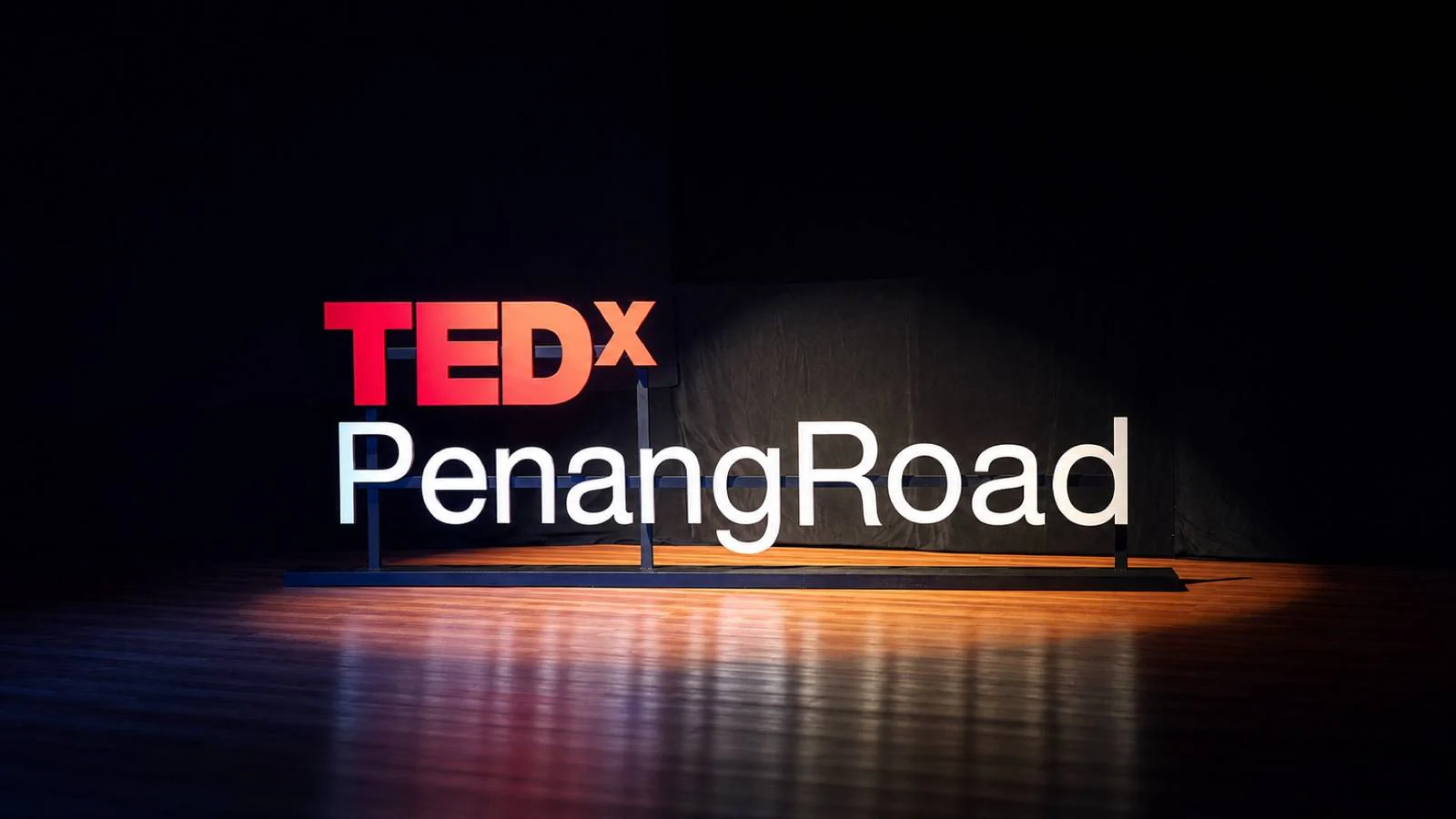 TEDx event stage graphics and backdrop installation